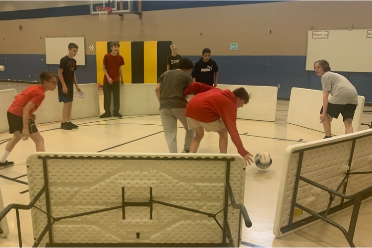 students playing gaga ball in a gymnasium